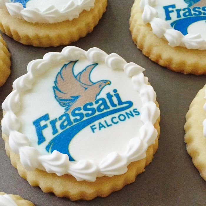 Using corn syrup to apply printed frosting sheets to cookies... Bake at 350°